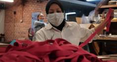 A volunteer makes face shields at the Biji biji Initiative in Malaysia